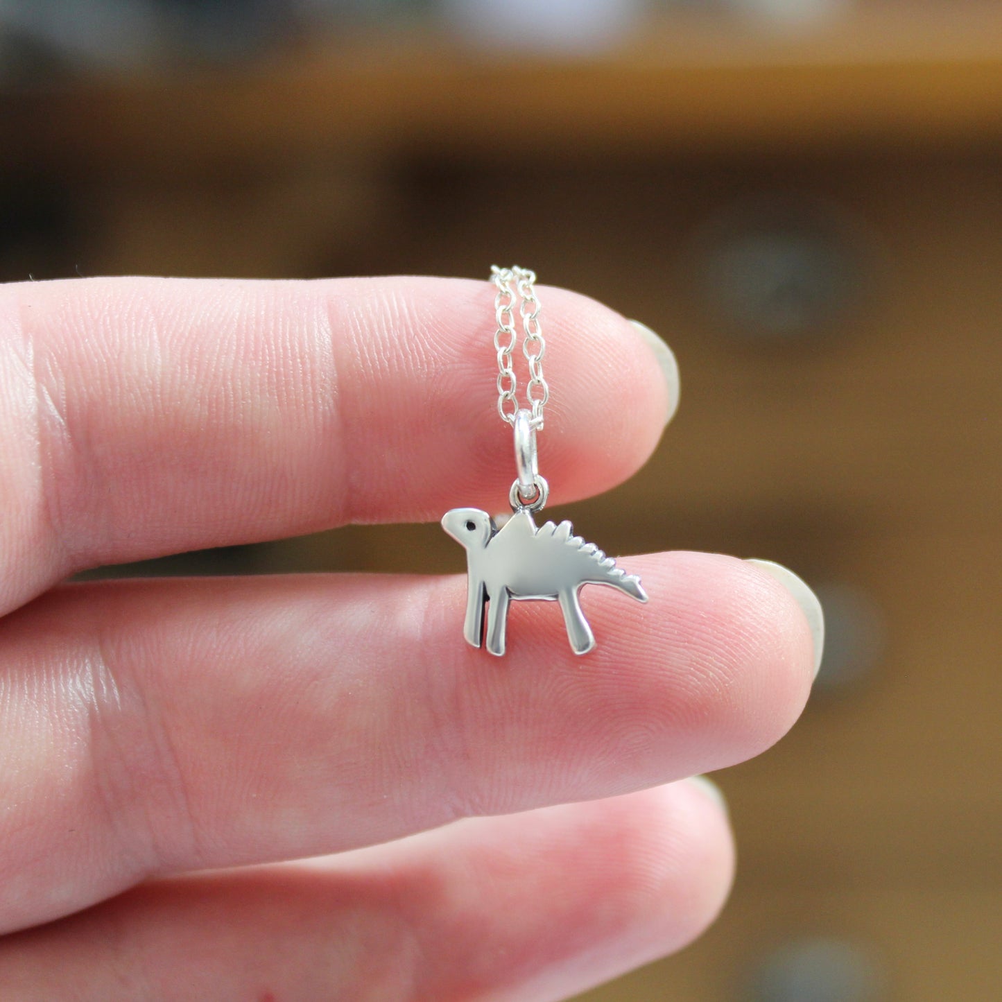 Sterling Silver Tiny Dinosaur Charm Necklace on Adjustable Chain