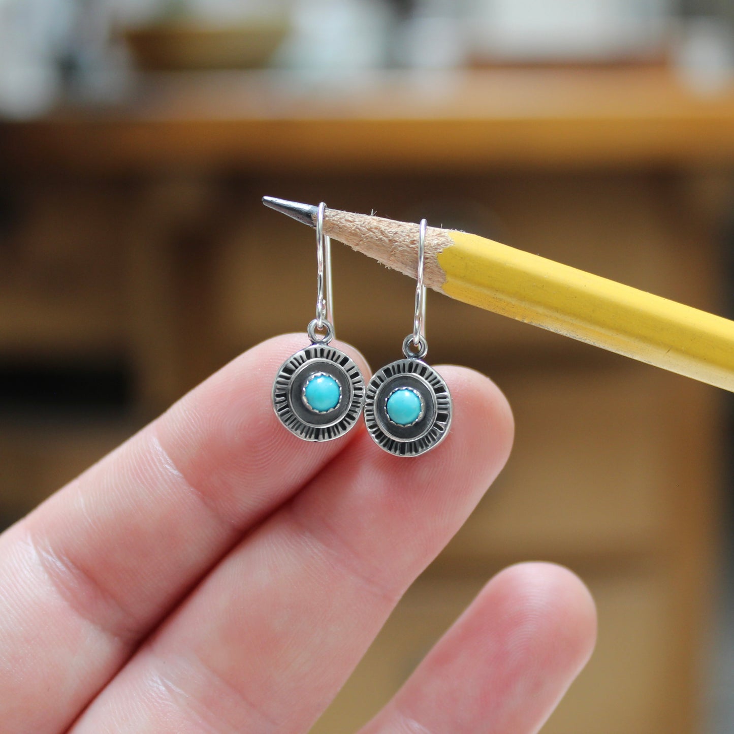 Tiny Turquoise Dangle Earrings in a Sterling Silver Starburst Setting