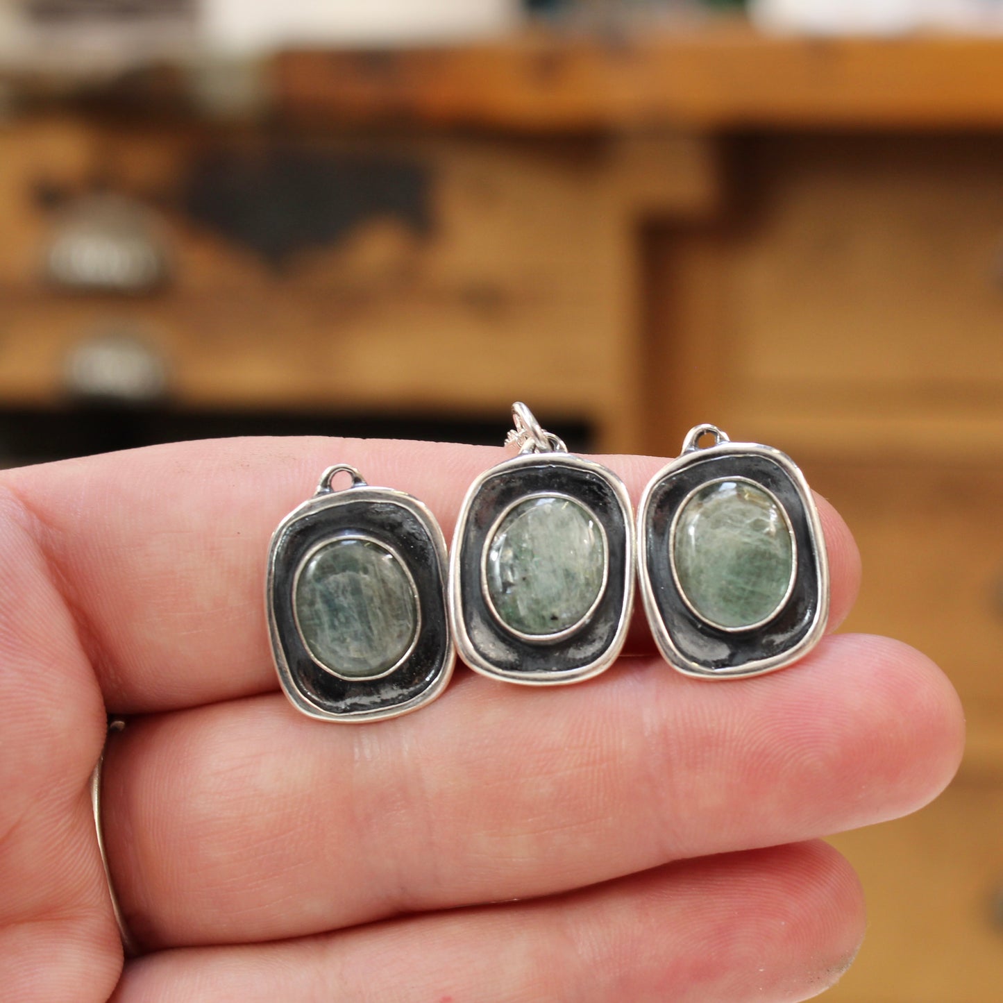 Shiny Green Kyanite Pendant in Sterling Silver Setting