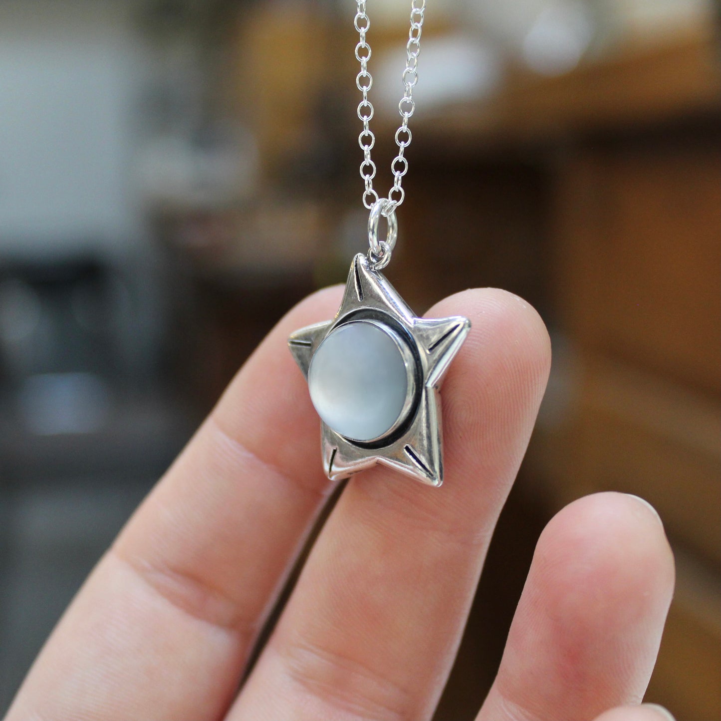 Sterling Silver Star Pendant with Moonstone Center on Adjustable Chain