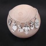 Good Dogs Charm Bracelet - Sterling Silver Bracelet with 6 Dog Charms