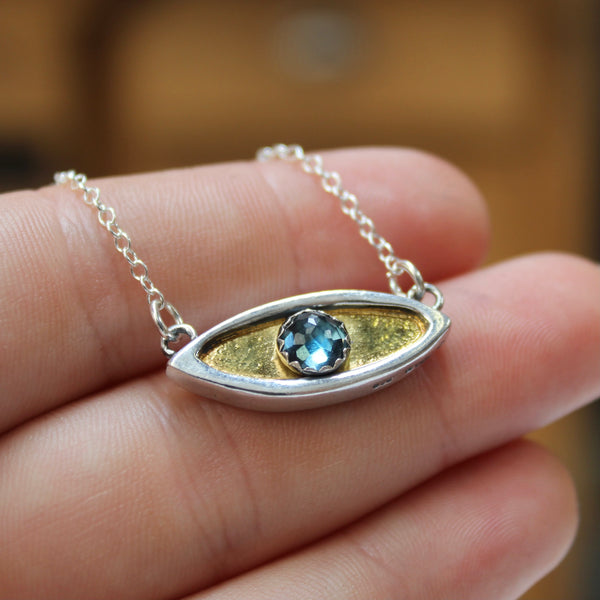 Handmade pendant store made of 925 silver, blue topaz and pearls, evil eye