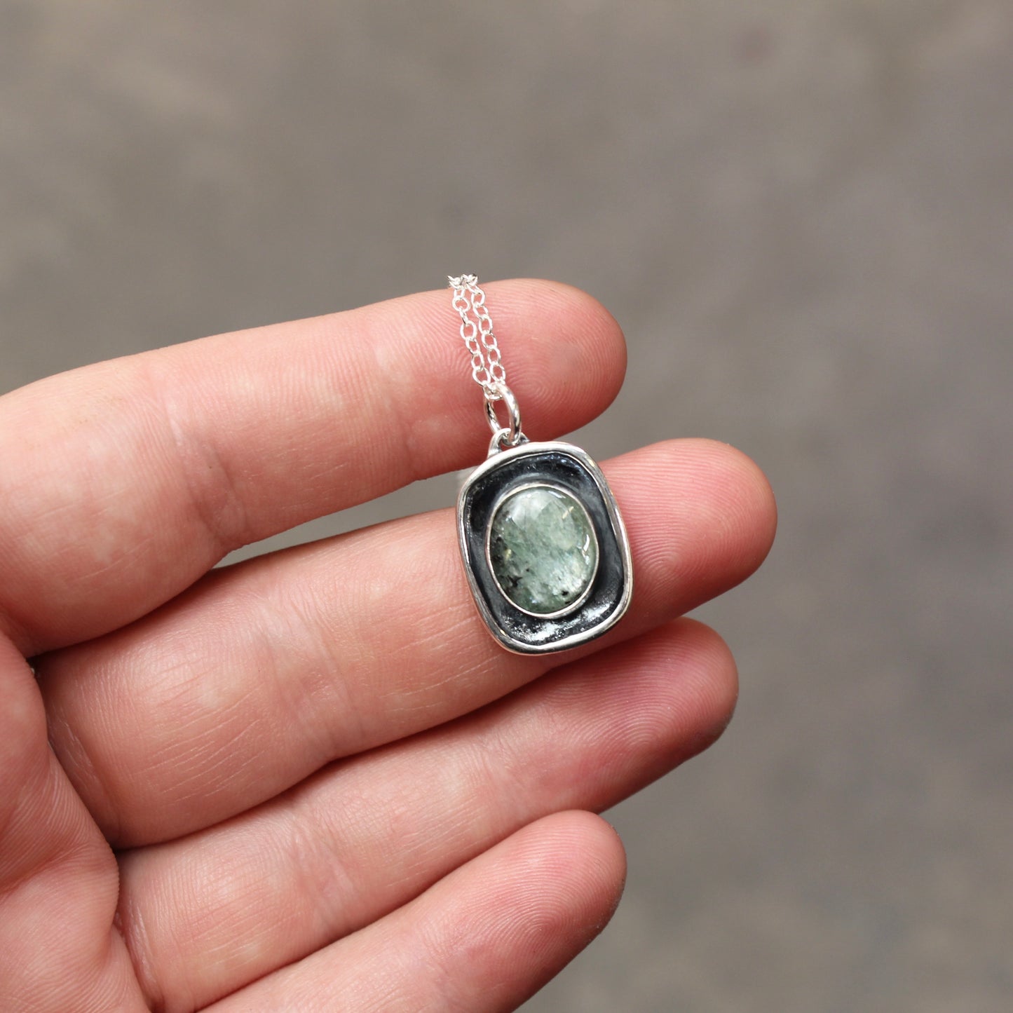 Shiny Green Kyanite Pendant in Sterling Silver Setting