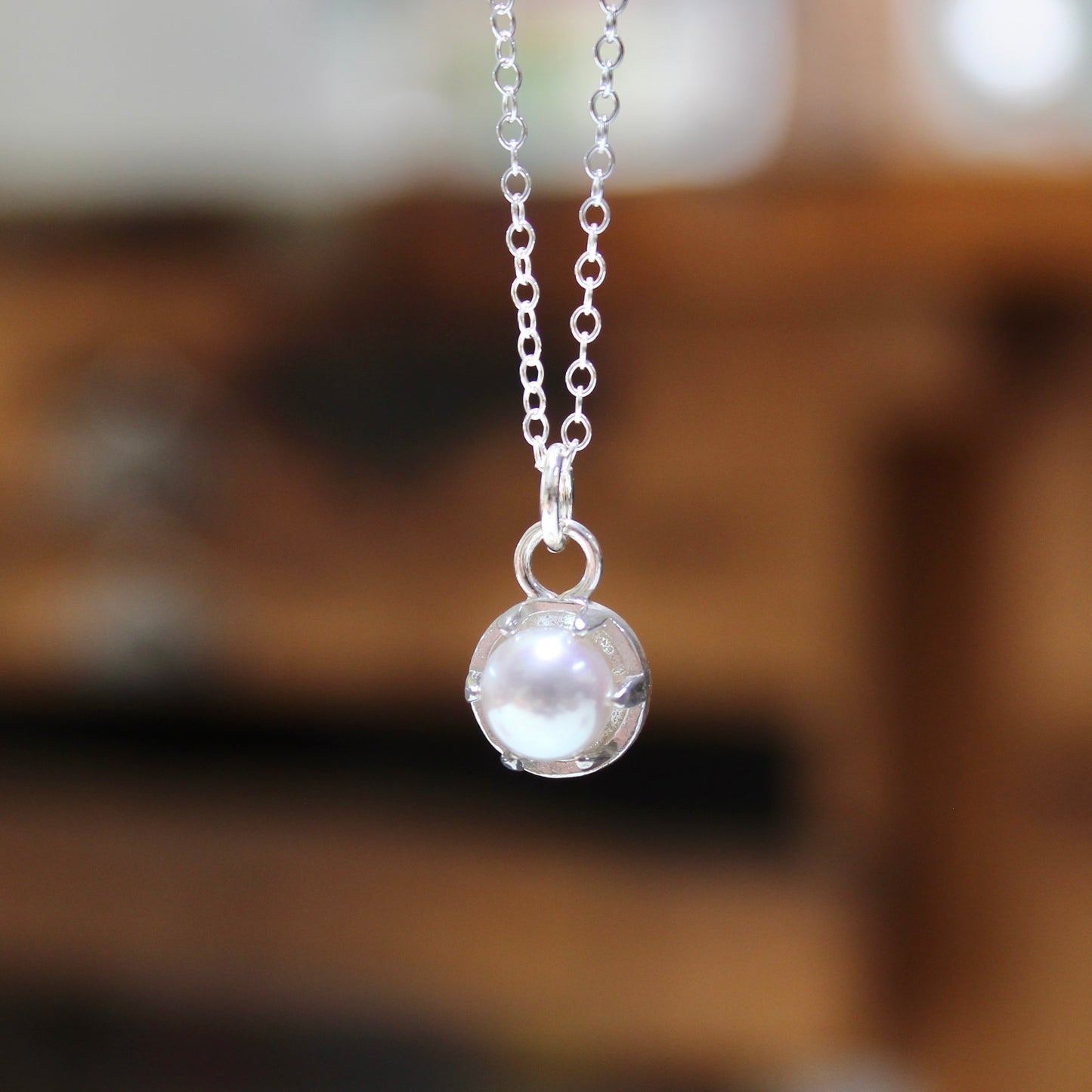 Tiny Pearl Necklace in a Sterling Silver Prong Setting