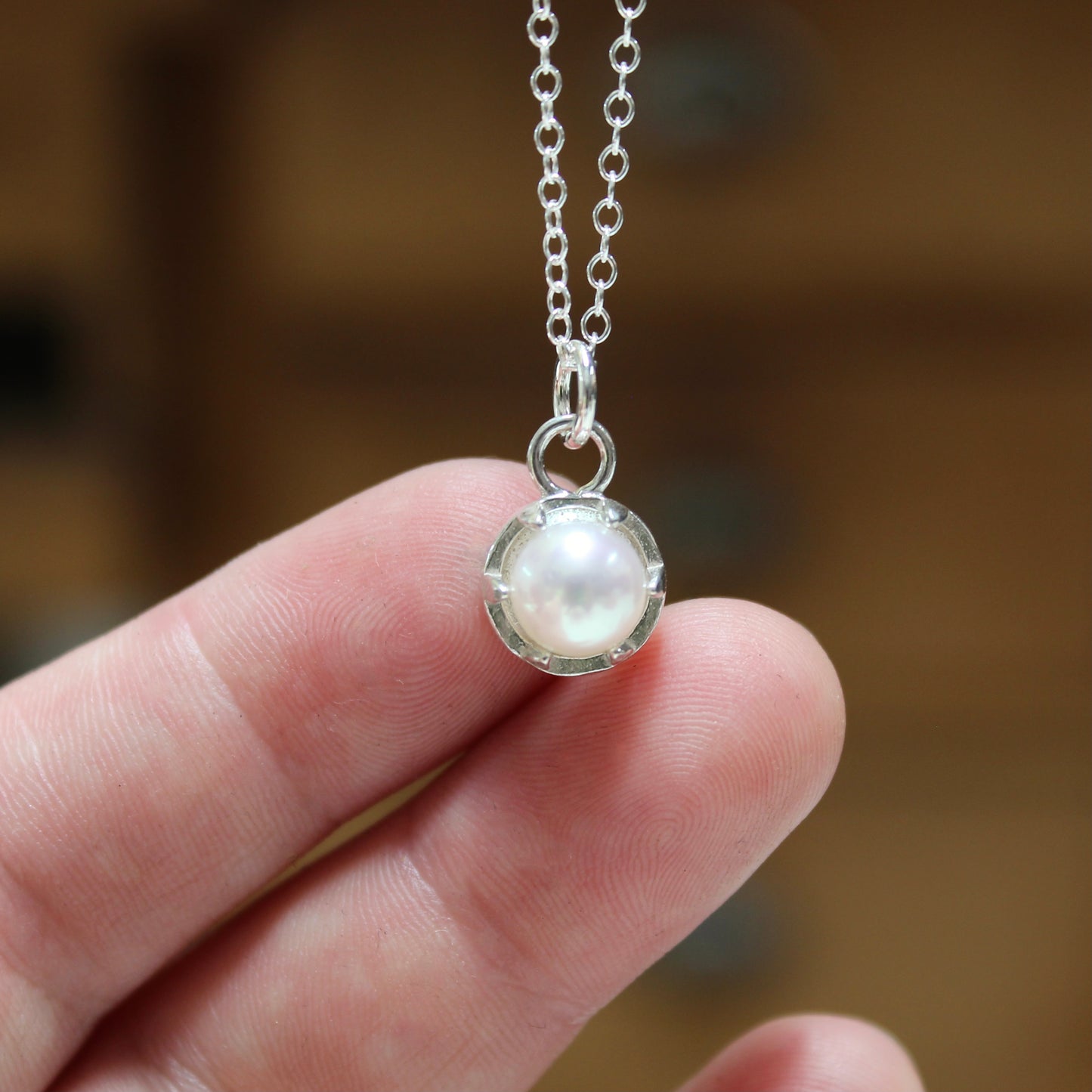 Tiny Pearl Necklace in a Sterling Silver Prong Setting
