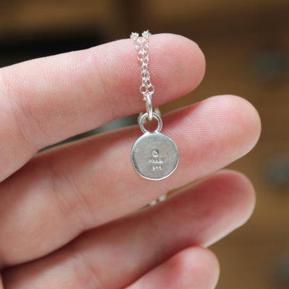 Tiny Pearl Necklace in a Sterling Silver Prong Setting