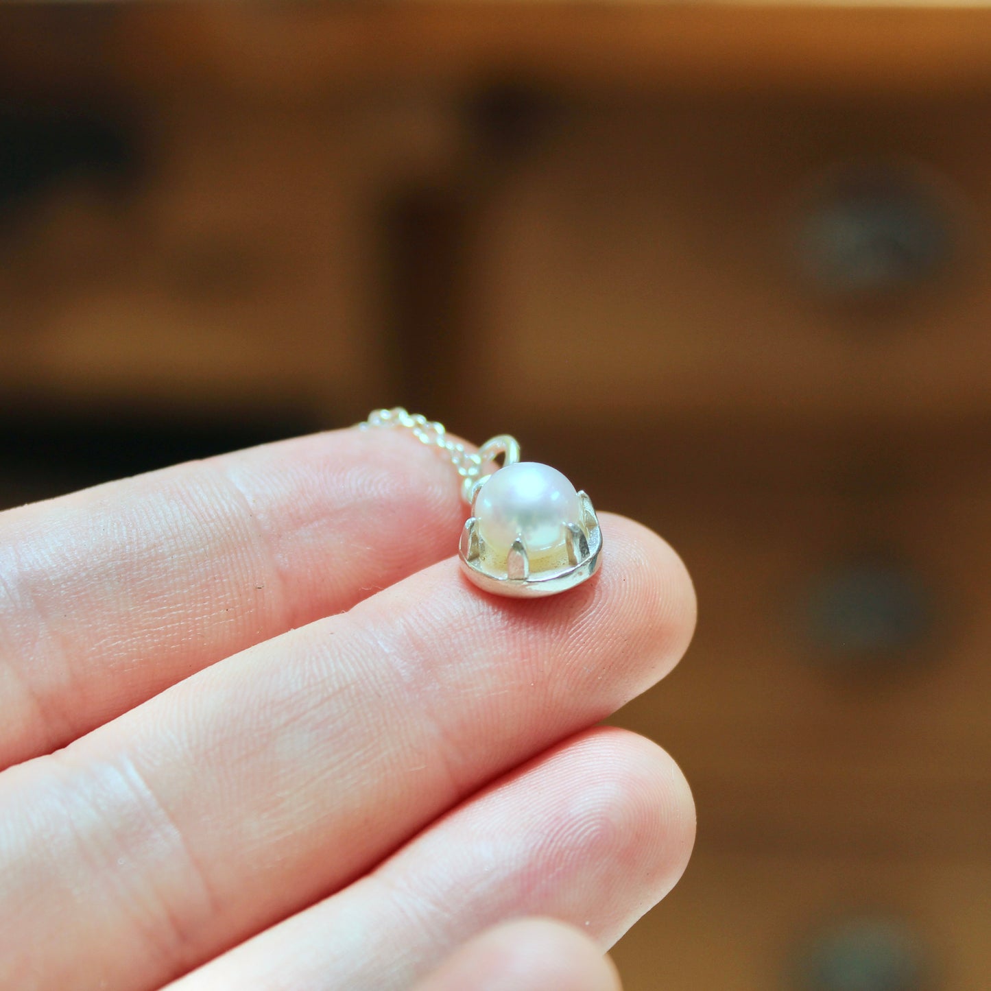 Tiny Pearl Necklace in a Sterling Silver Prong Setting