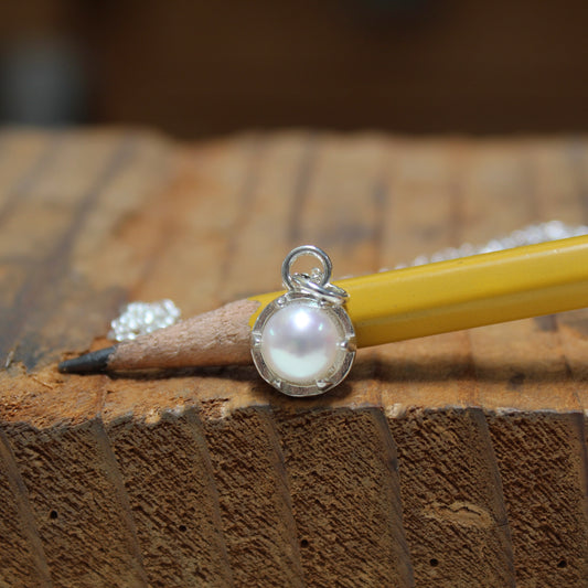 Tiny Pearl Necklace in a Sterling Silver Prong Setting