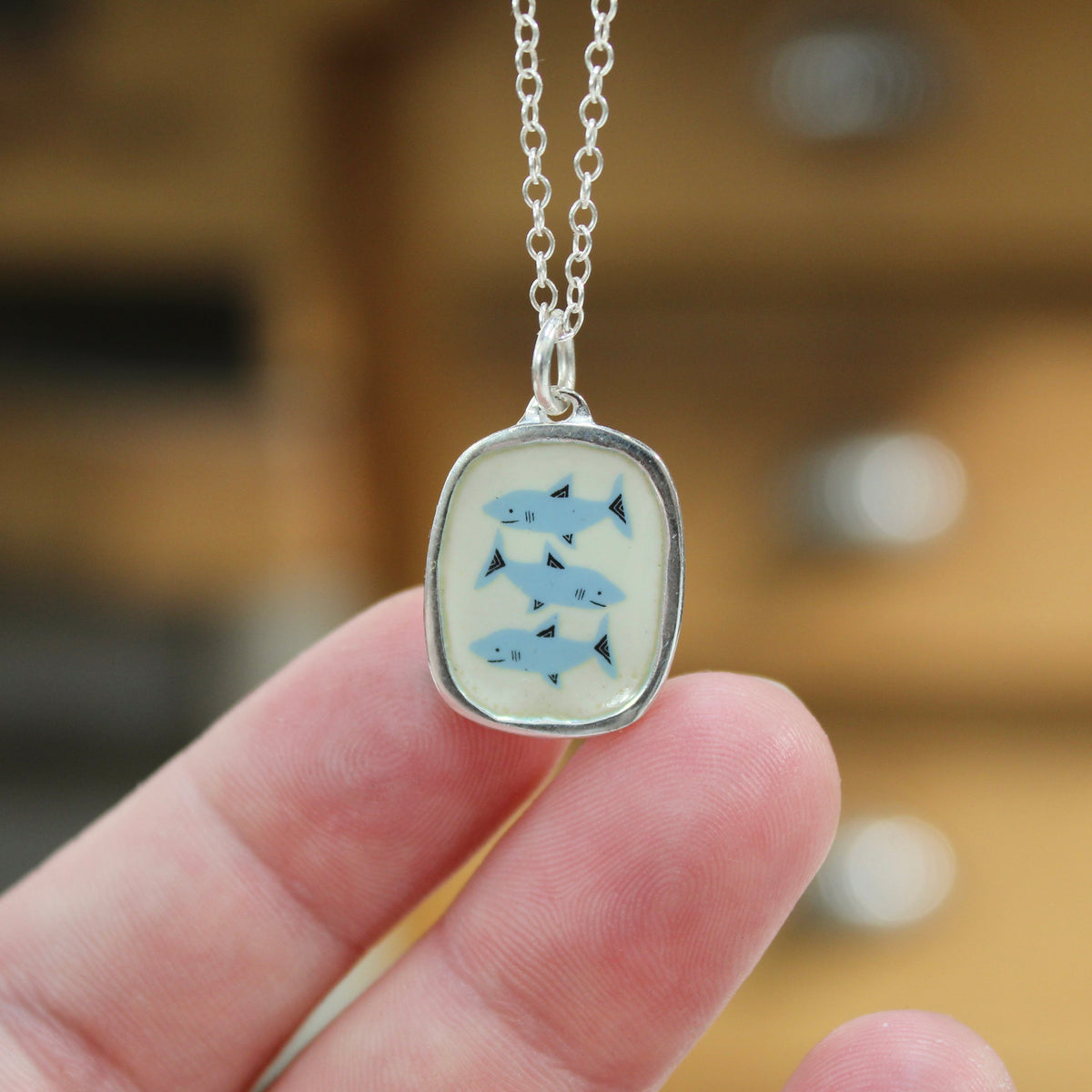 Three Sharks Pendant Necklace in Sterling Silver and Enamel