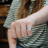 Sterling Silver and Enamel Love Dog Ring on Light Blue