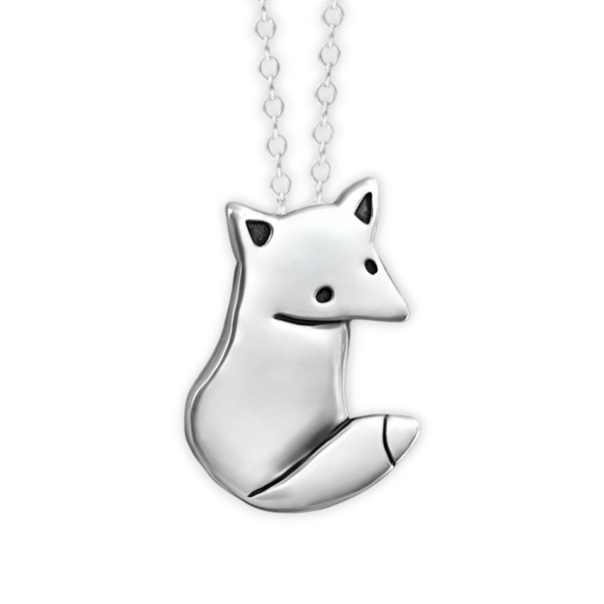 Silver fox pendant necklace on a white background