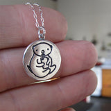 Round Sterling Silver Otter Charm Necklace on Adjustable Sterling Chain
